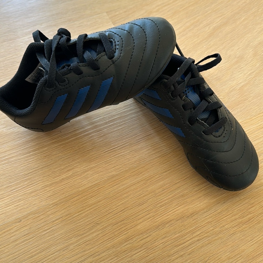 Adidas black and blue cleats size 11